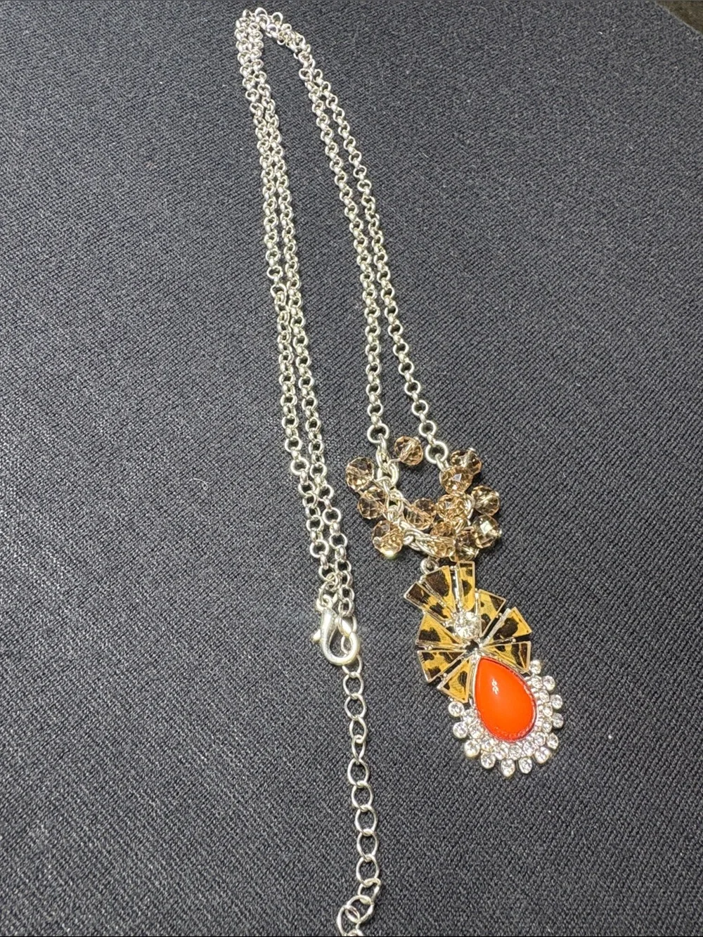 Silver Tone Necklace with Orange Teardrop Pendant and Crystal Accents